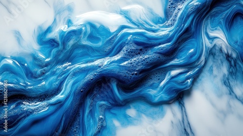 Abstract blue and white fluid art creating a river-like effect on a marble background