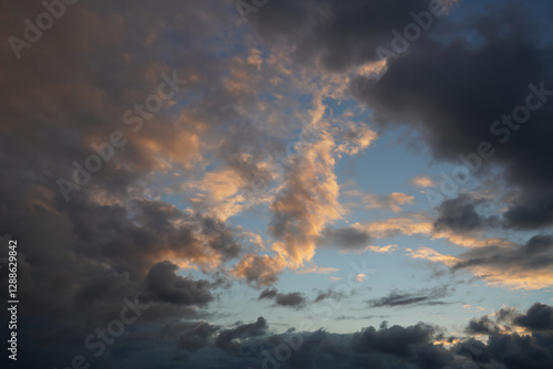 Beautiful cloudy sky after the rain. Panoramic view of the stormy sky and dark clouds. Concept on the theme of weather, natural disasters. High quality photo