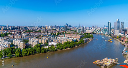 Canvas Print An aerial view over a bend in the river Thames at Vauxhall, London, UK in summer