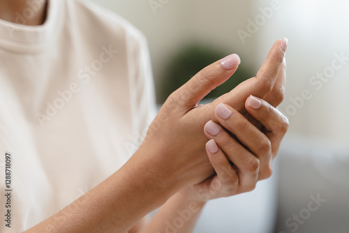 Close-up shot of human hands suffering from ligament inflammation on the palm.