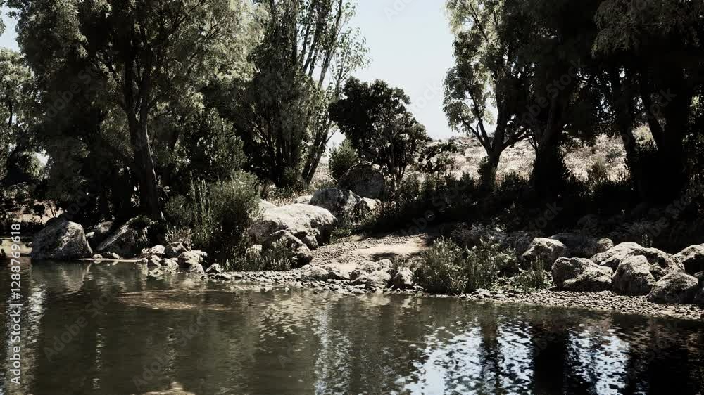 A tranquil riverside setting features lush trees and smooth rocks along the waters edge, reflecting the calm atmosphere under a clear sky, inviting peace and solitude. A tranquil riverside setting features lush trees and smooth rocks along the waters edge, reflecting the calm atmosphere under a clear sky, inviting peace and solitude.