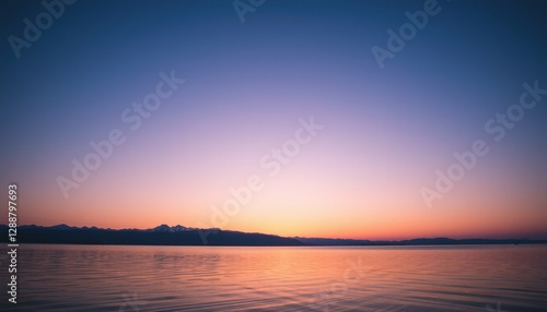 Calm Sunset Over Water, Blue, Purple and Pink Sky, Evening Landscape Horizon, Photograph.