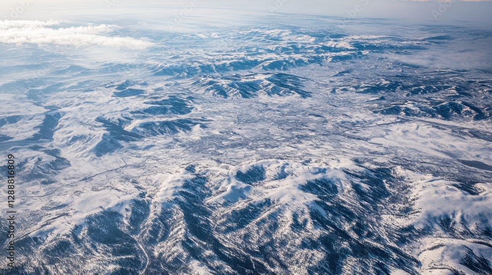 Fototapeta premium An aerial view of a snow covered landscape