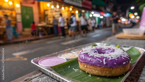 Colorful frosted donuts at an outdoor night market