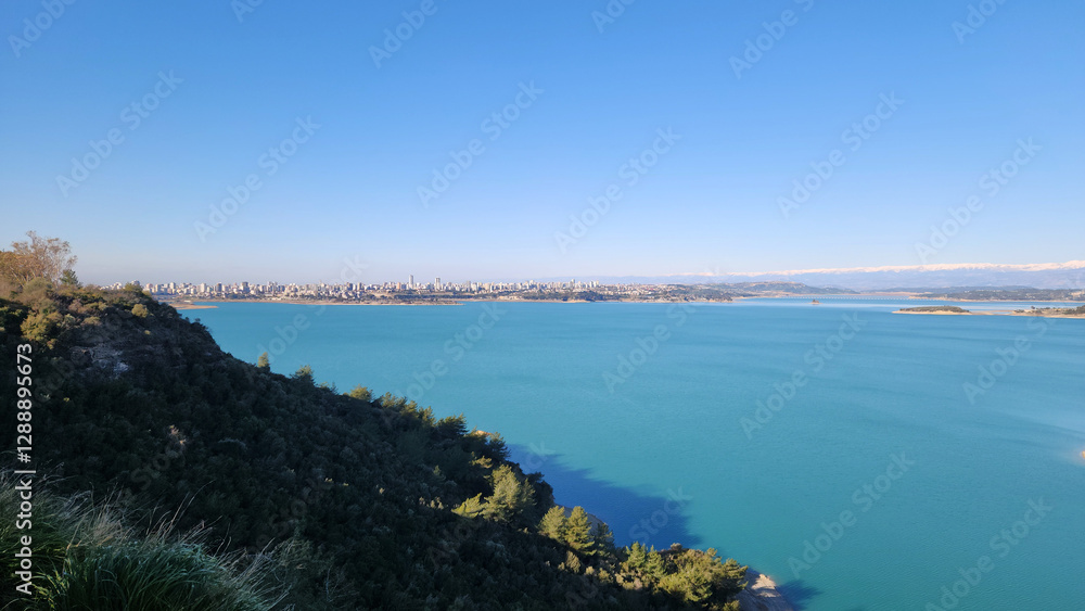 View of the Cukurova district center of Adana city located by the side of Seyhan Dam Lake on Seyhan River View of the Cukurova district center of Adana city located by the side of Seyhan Dam Lake on Seyhan River