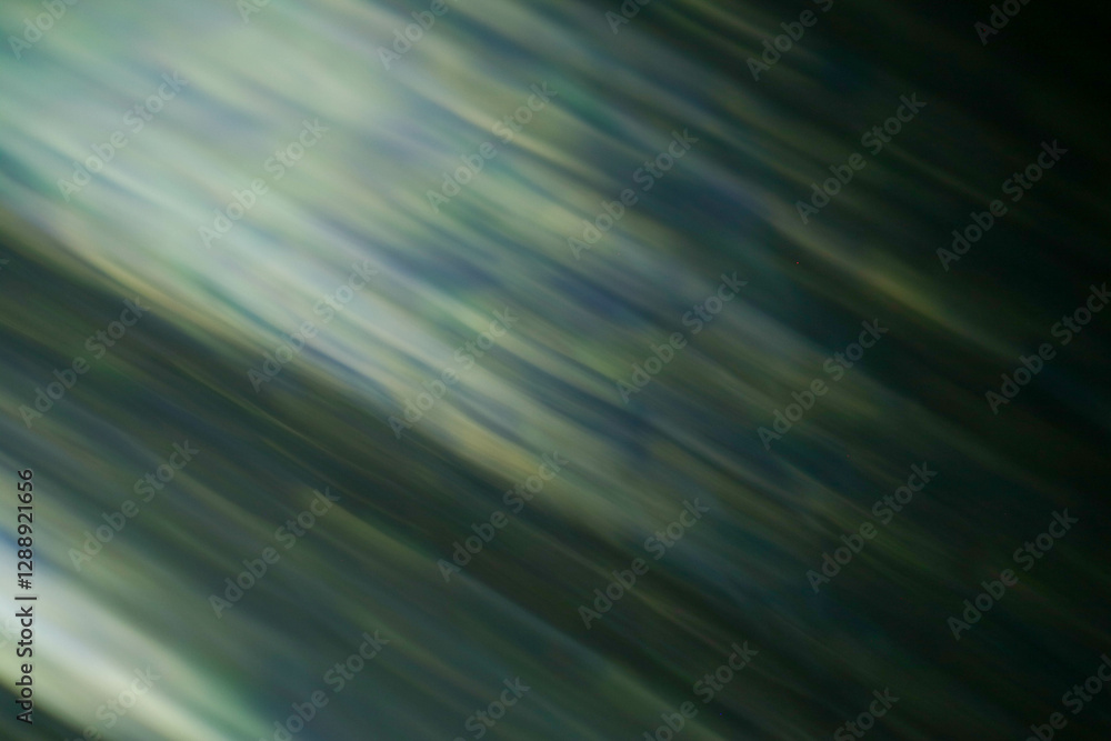 Fototapeta premium Dynamic Green Light Motion with Blurred Gradient Effect for a Dreamy Background