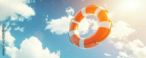 Wallpaper Mural Orange Lifebuoy Floating in a Sunny Sky with Clouds Rescue Hope Safety Torontodigital.ca