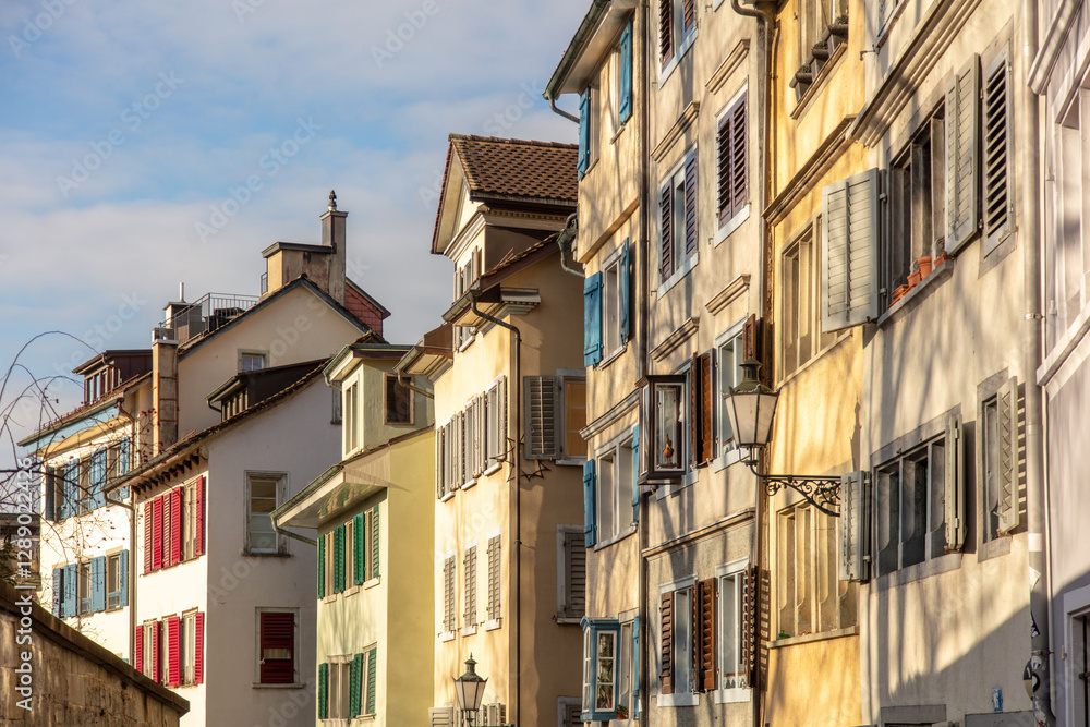 Obraz premium Switzerland, Zurich. Old town Altstadt architecture. Traditioanl buildings on a narrow alley.