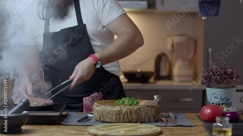 Chef close-up preparing beef with root vegetables. cooking process