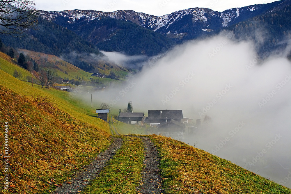 Mountain village near Zell am See in Austria - a small mountain village lost in the clouds
