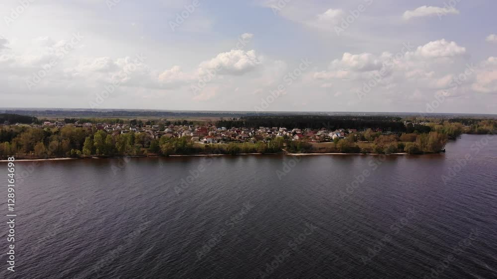 Beautiful Lake With Islands is Surrounded by Trees and Houses Beautiful Lake With Islands is Surrounded by Trees and Houses