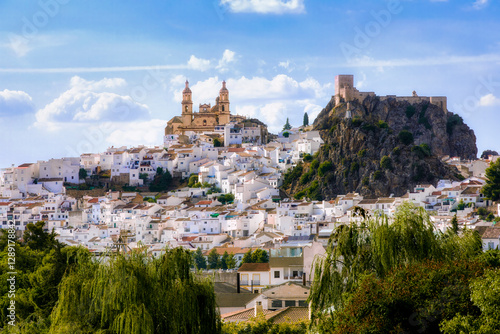 The Beautiful White Town of Olvera in Andalusia, Spain, with the Parish of Our Lady of the Incarnation Church and the Castle of Olvera