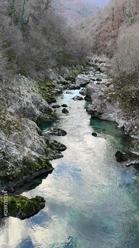 Wallpaper Mural Mountain river winding through rocky canyon with crystal clear water Torontodigital.ca