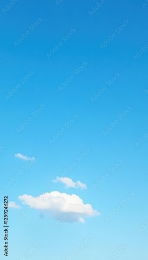 A few wispy clouds drifting lazily beneath a clear blue sky, airy, light A few wispy clouds drifting lazily beneath a clear blue sky, airy, light