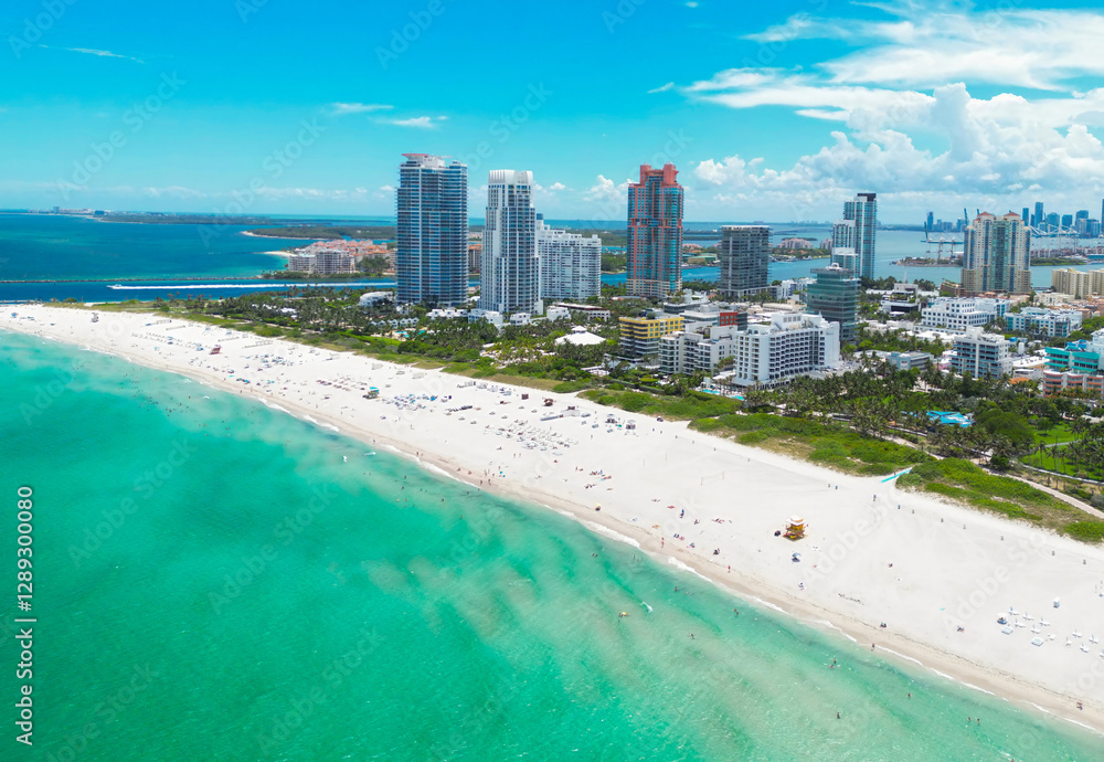 Naklejka premium Top view of South Miami Beach. Scenic drone view of Miamis famous coastline. Miami Beach skyline with skyscrapers. Aerial view of Miami Beach in summer. Miami Beach shore with skyscrapers.