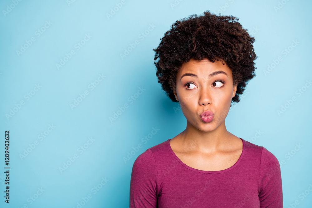 Portrait of negative anxious dark skin girl with lips pouted plump look stare made mistake worry wear style clothes isolated over blue color background Portrait of negative anxious dark skin girl with lips pouted plump look stare made mistake worry wear style clothes isolated over blue color background