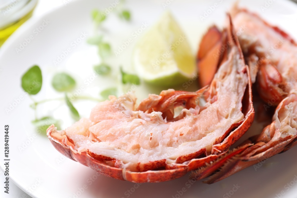 Delicious boiled lobster served on white table, closeup Delicious boiled lobster served on white table, closeup