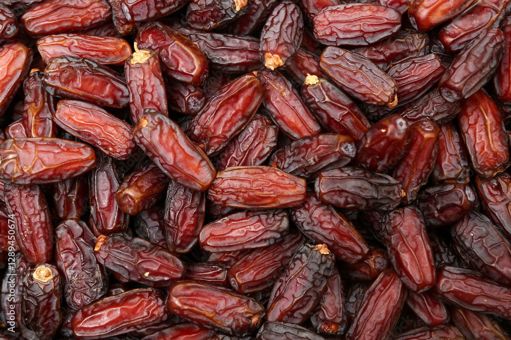 Fresh Dates background. Healthy organic product. Top view. Close up. Fresh Dates background. Healthy organic product. Top view. Close up.