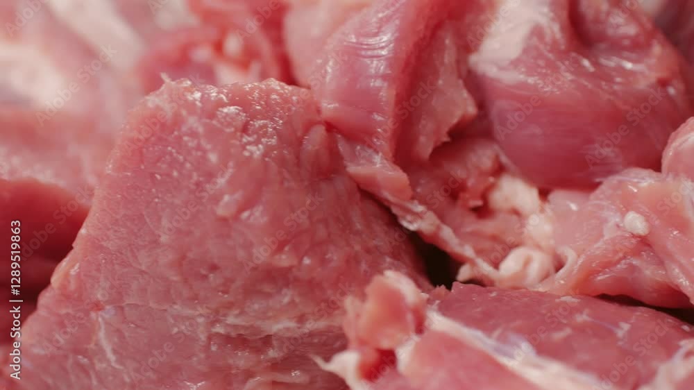 Chef Butcher cutting pork meat with knife on kitchen, cooking Mexican traditional food. Man cut big beef piece for barbecue bbq. Chef Butcher cutting pork meat with knife on kitchen, cooking Mexican traditional food. Man cut big beef piece for barbecue bbq.
