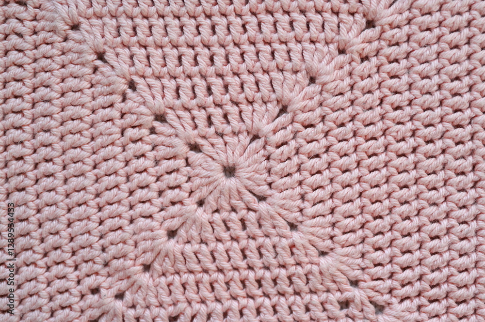 pink crocheted fabric as a background, handmade, close-up of a fragment of a blanket
pink crocheted fabric as a background, handmade, close-up of a fragment of a blanket