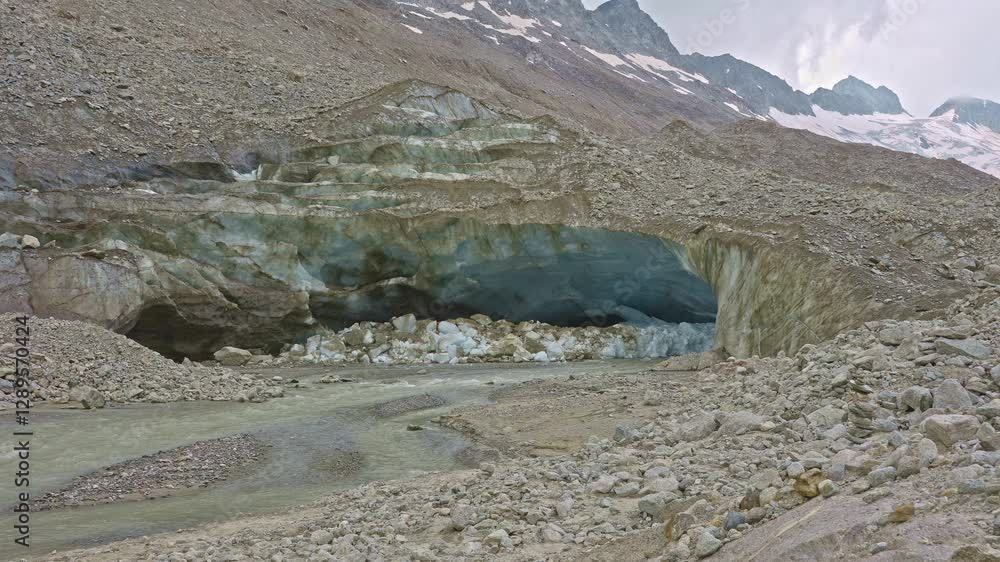 custom made wallpaper toronto digitalWater stream flowing out of the glacier. Upper Aare-Glacier, Oberaargletscher, Grimsel Pass, Canton of Berne, Switzerland.