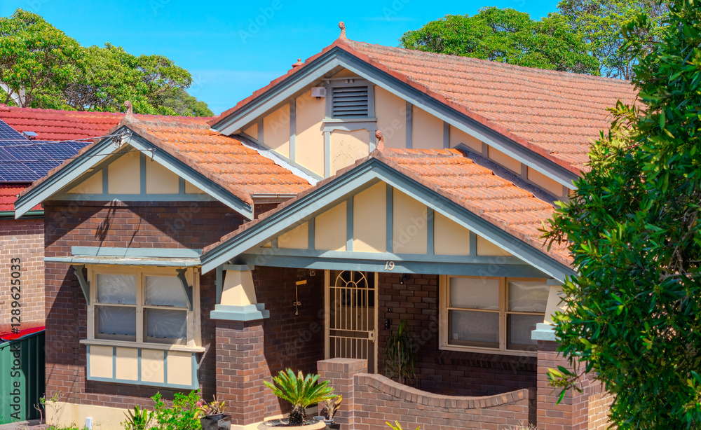 Fototapeta premium Drone Aerial View of an inner western Sydney Suburban residential Brick house in Sydney NSW Australia