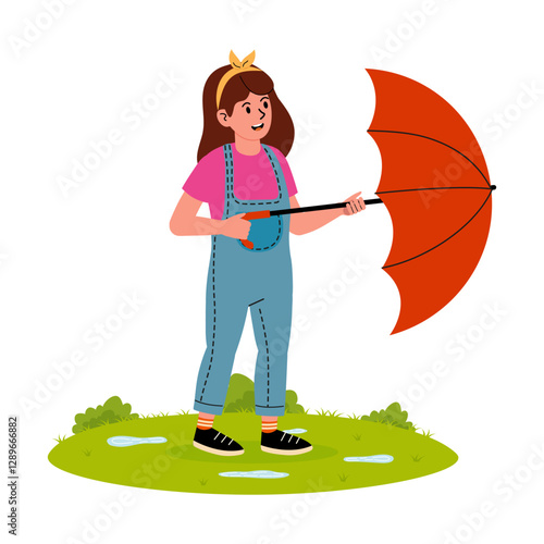 Girl holding a bright umbrella on a grassy patch in a playful outdoor setting