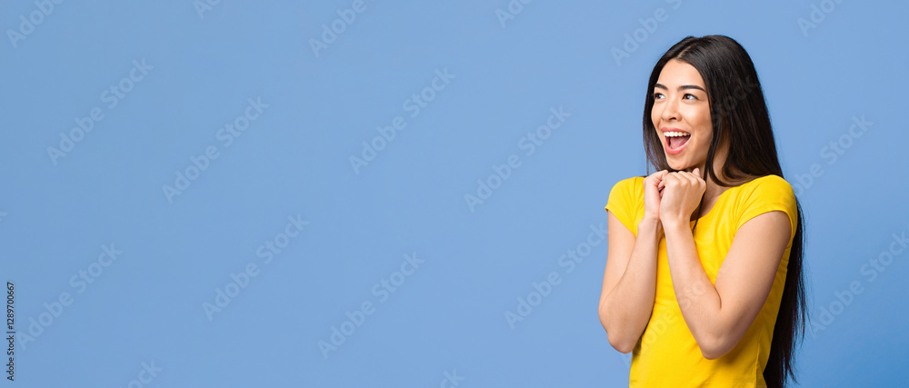 Excited Asian Female Looking At Copy Space And Exclaiming With Excitement, Clenching Fists In Happy Shock, Amazed By Nice Offer Or Big Sales, Standing Over Purple Background, Panorama Excited Asian Female Looking At Copy Space And Exclaiming With Excitement, Clenching Fists In Happy Shock, Amazed By Nice Offer Or Big Sales, Standing Over Purple Background, Panorama