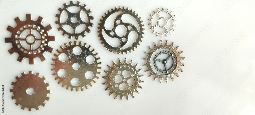 Exploring mechanical gears and cogs arrangement workshop photography industrial environment close-up view engineering concept Exploring mechanical gears and cogs arrangement workshop photography industrial environment close-up view engineering concept