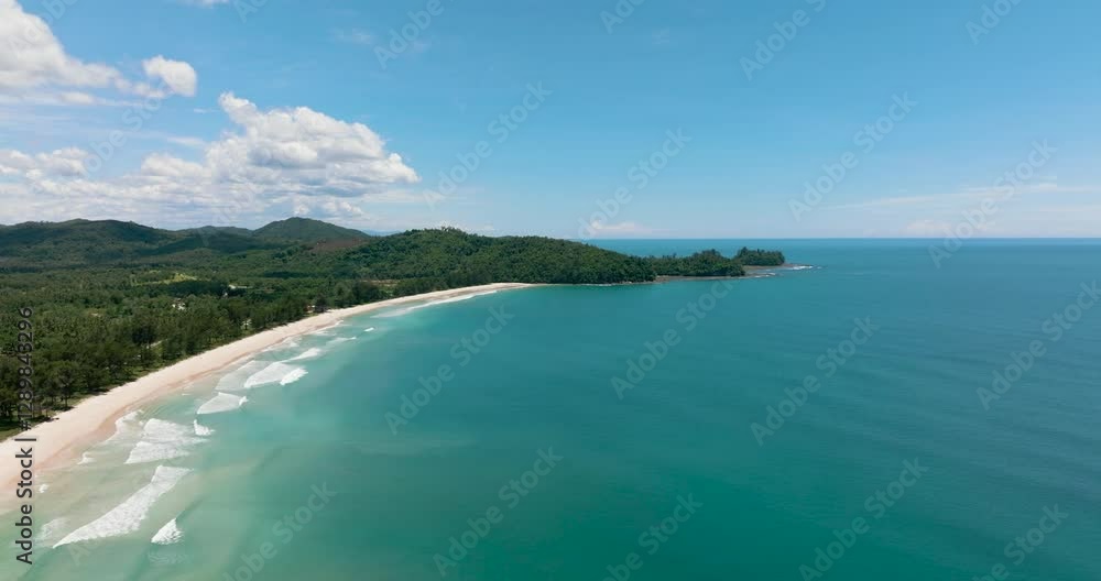 Sandy beach and turquoise water of the tropical sea. Kalampunian beach. Sabah, Borneo, Malaysia. Sandy beach and turquoise water of the tropical sea. Kalampunian beach. Sabah, Borneo, Malaysia.