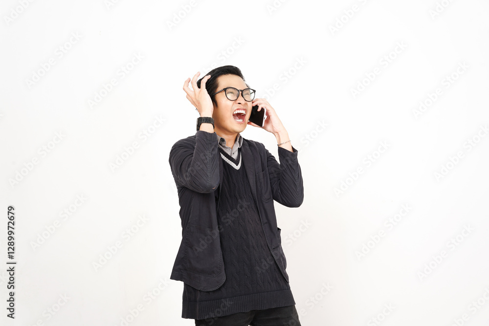 Mad Angry while on phone Of Handsome Asian Man Isolated On White Background Mad Angry while on phone Of Handsome Asian Man Isolated On White Background