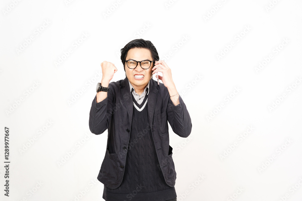 Mad Angry while on phone Of Handsome Asian Man Isolated On White Background Mad Angry while on phone Of Handsome Asian Man Isolated On White Background
