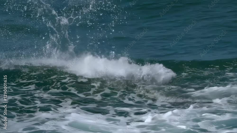 A powerful ocean wave crashes, sending water droplets flying in a dramatic splash, capturing the energy and beauty of the sea. A powerful ocean wave crashes, sending water droplets flying in a dramatic splash, capturing the energy and beauty of the sea.