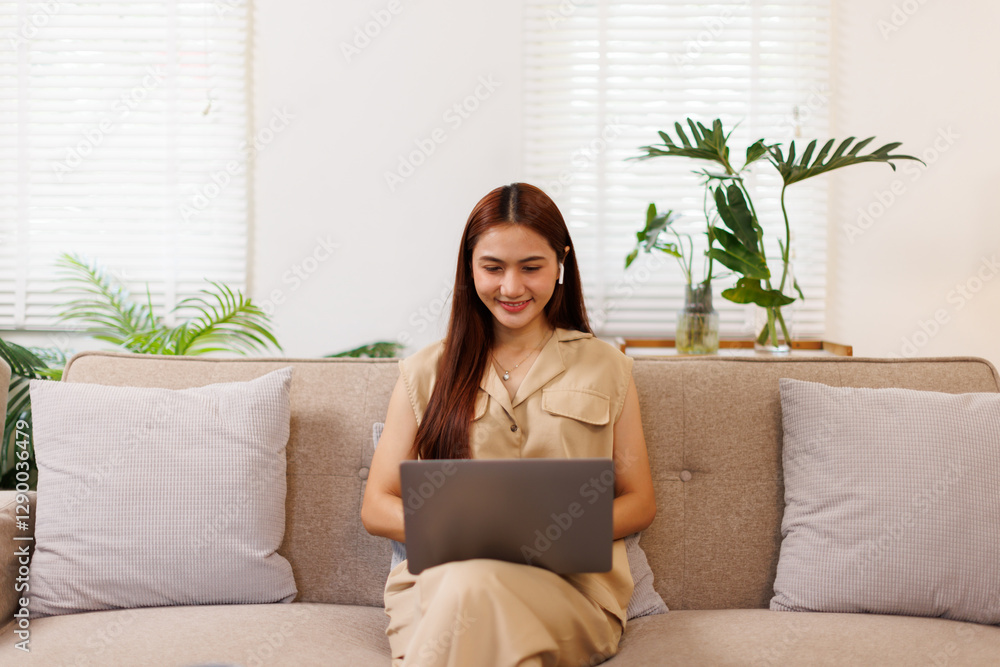 photo of young asian woman happy positive smile sit couch look browse laptop indoors
photo of young asian woman happy positive smile sit couch look browse laptop indoors