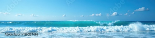Rolling waves meet clear blue sky in wide seascape , panoramic, graphic, texture
