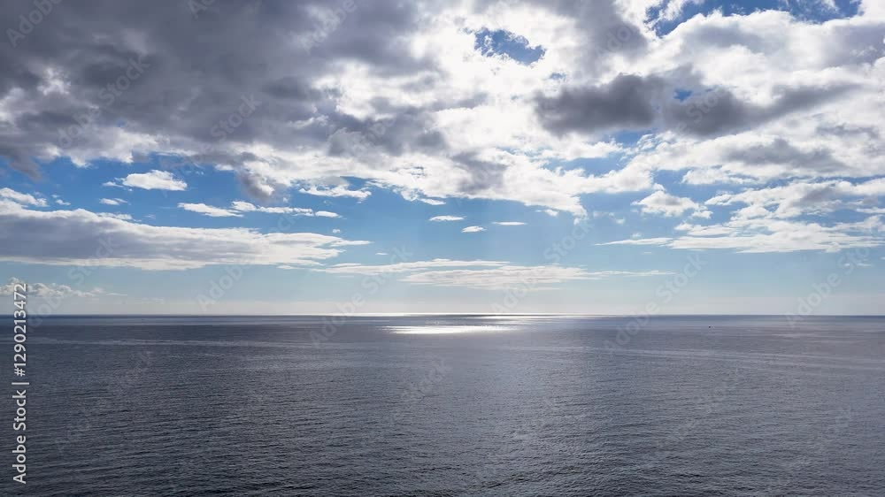Aerial View of the Atlantic Ocean Horizon with Clouds and Sun Spots from Madalena do Mar, Madeira