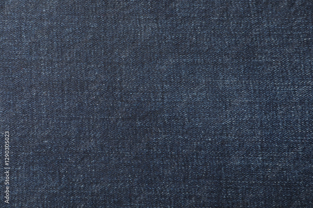 Texture of dark blue jeans as background, closeup Texture of dark blue jeans as background, closeup