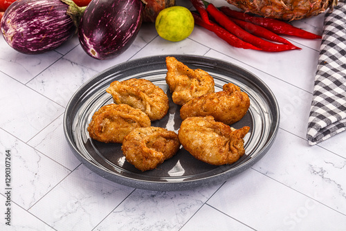 Tibetian fried momo stuffed dumplings photo