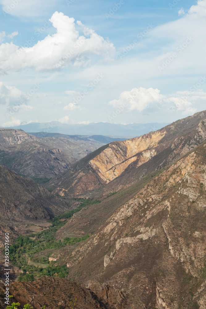 Beautiful mountain scenery and green forest from the top of the cliff Beautiful mountain scenery and green forest from the top of the cliff