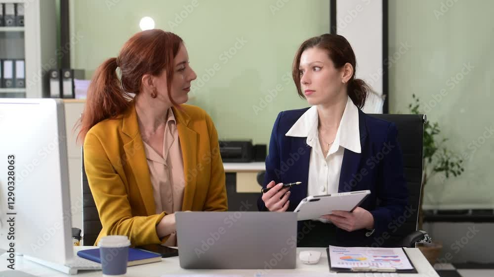 Business colleague business presents and explains and using laptop and tablet. Teamwork, financial marketing team Business colleague business presents and explains and using laptop and tablet. Teamwork, financial marketing team