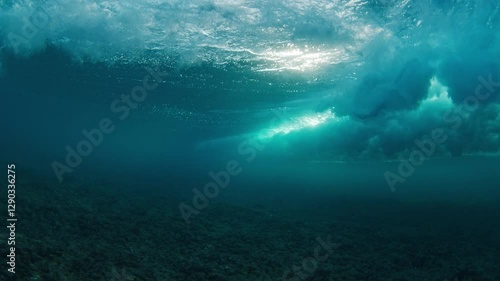 Wallpaper Mural Surfer rides a wave from an underwater perspective. Maldives Torontodigital.ca