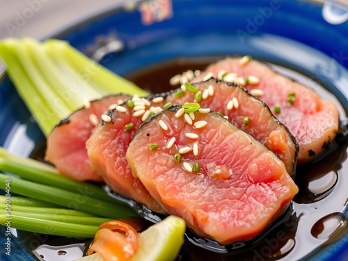 Wallpaper Mural Beef tataki slices with savory sauce and sesame seeds on a vibrant blue plate, traditional Japanese cuisine, blue plate, sauce Torontodigital.ca