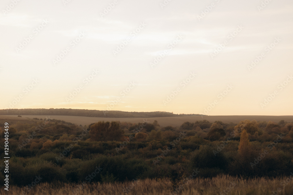 Serene Sunset View Over Rolling Hills and Verdant Nature Scene Serene Sunset View Over Rolling Hills and Verdant Nature Scene
