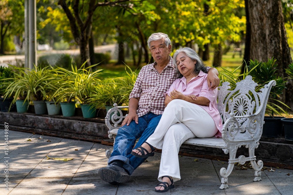 Elderly Couple Enjoying a lovely Moment on Park Bench Elderly Couple Enjoying a lovely Moment on Park Bench