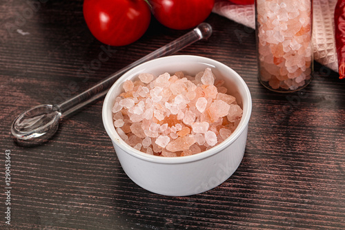 Rose pink Himalai salt in the bowl photo