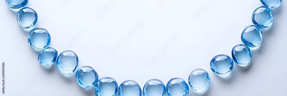 Fototapeta premium Elegant Blue Gemstones Arranged in a Semi Circle on White Background