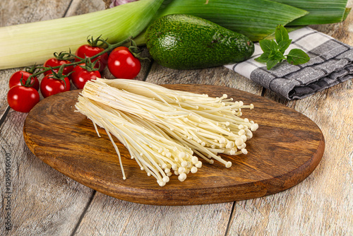 Raw enoki mushroom for cooking photo