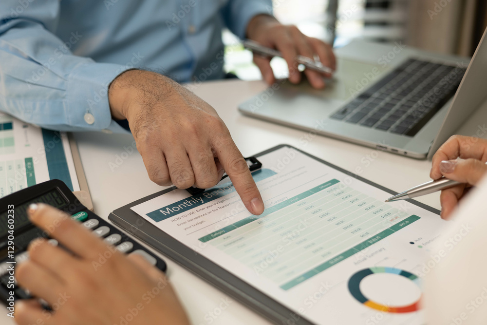 A man and a woman are looking at a piece of paper with graphs on it. They are discussing the data and making decisions based on it
A man and a woman are looking at a piece of paper with graphs on it. They are discussing the data and making decisions based on it