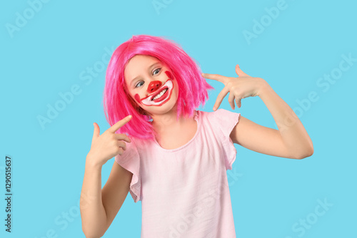 Funny girl in clown costume...