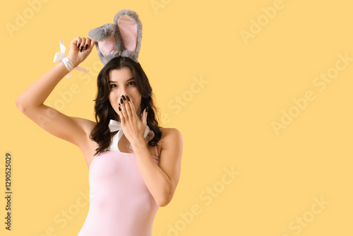 Surprised young woman in bu...